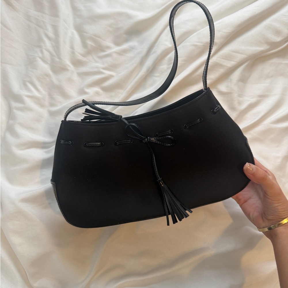 Express Elegant Black Shoulder Bag with Tassel